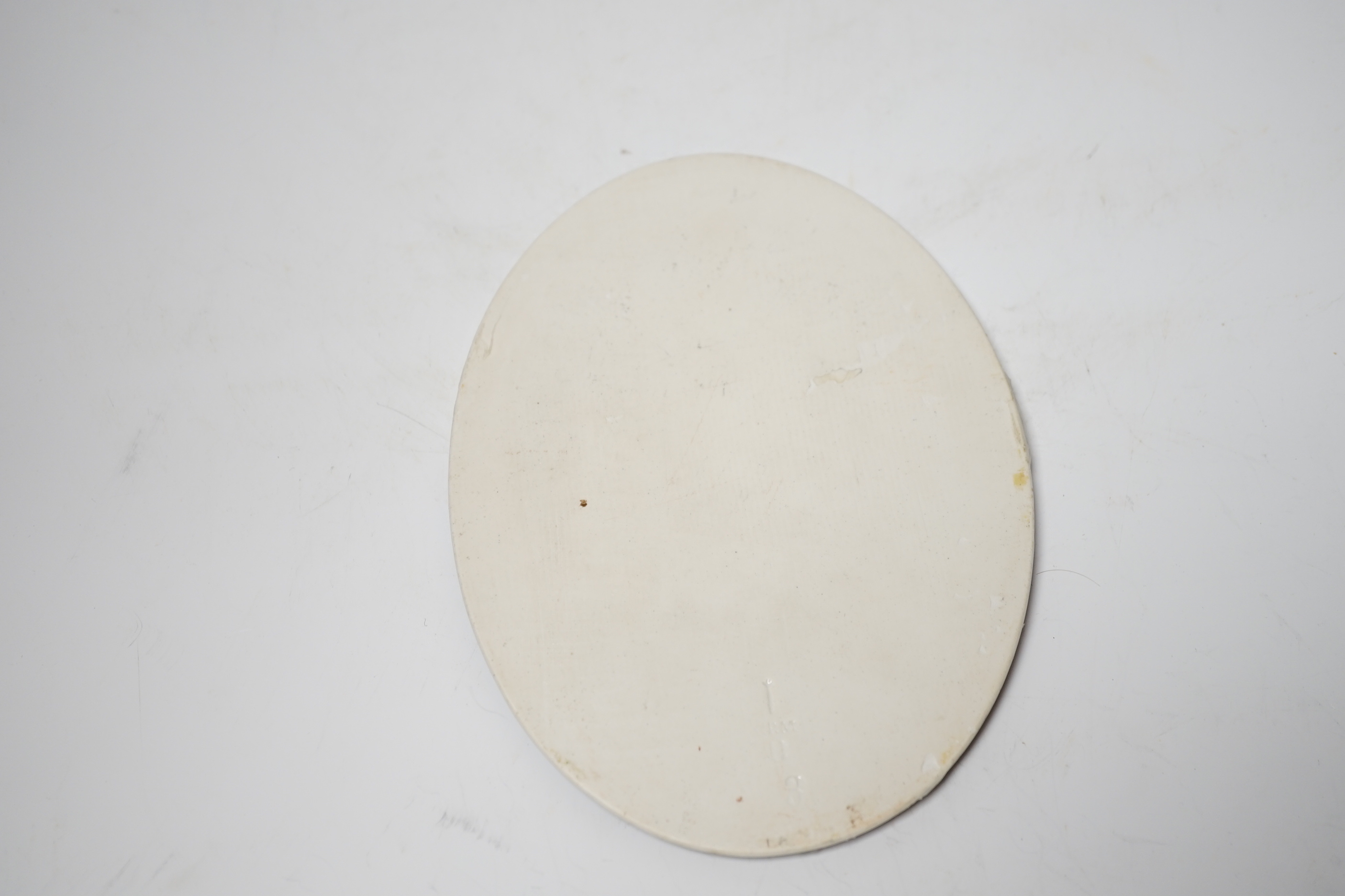 A Berlin KPM painted porcelain oval plaque, painted with a Persian lady, initialled JM, 18 x 13cm